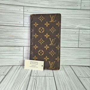 Louis Vuitton Vintage LV Monogram Bi Fold Wallet in Coated Canvas and Leather